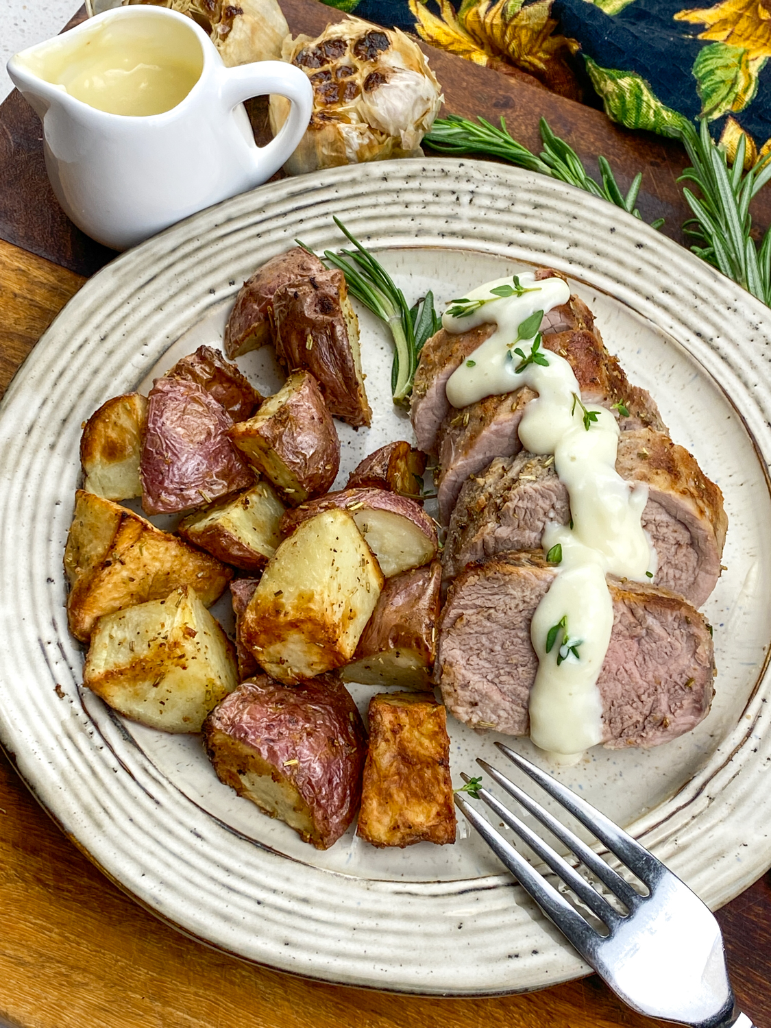 Air Fryer Pork Tenderloin and Red Potatoes  with Creamy Roasted Garlic Sauce
